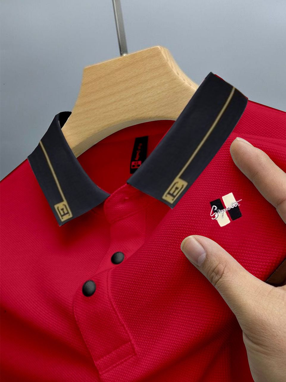 t1 Scarlet Red Polo with Black and Gold Trimmed Collar and Signature Logo - Image 1